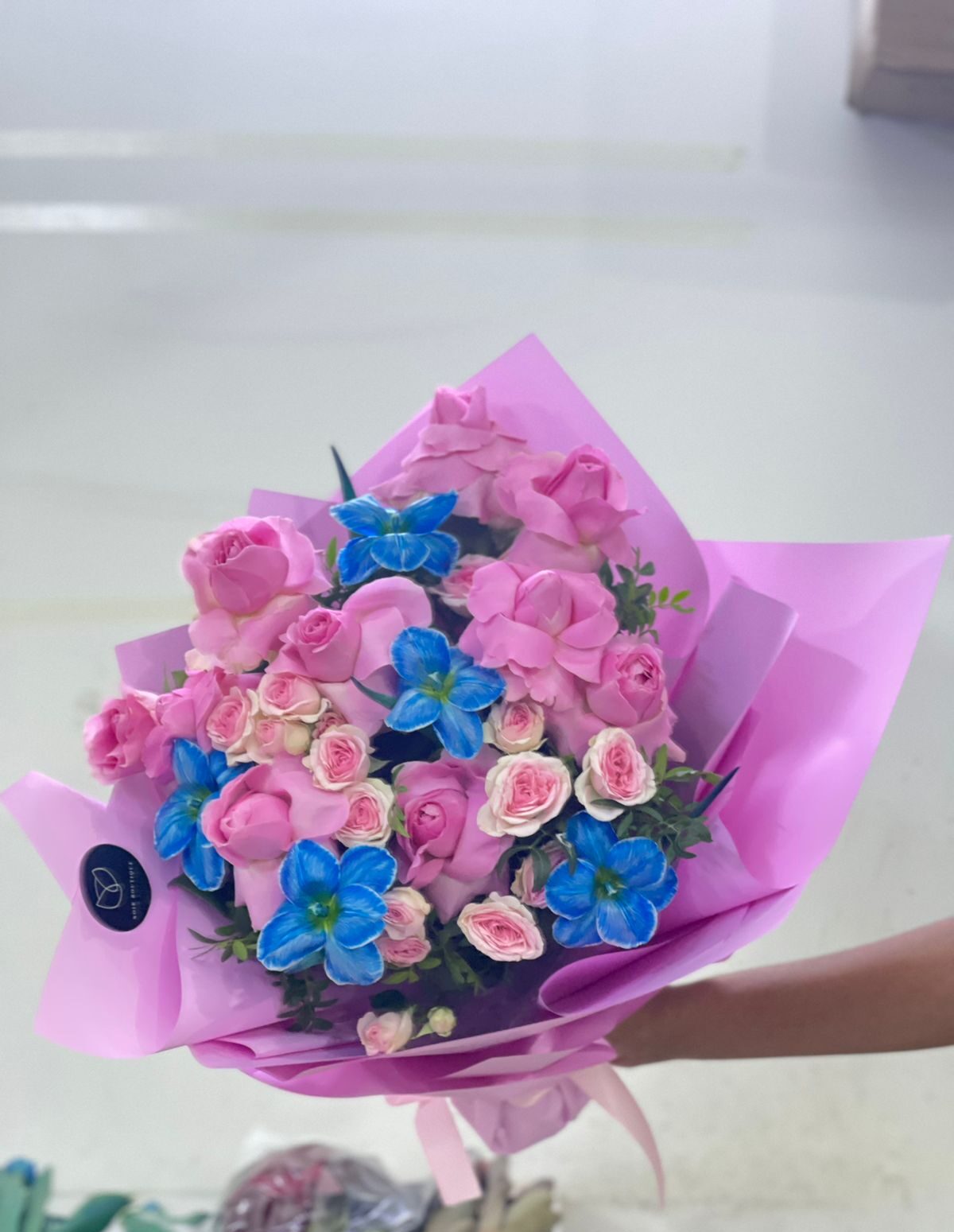 Blue Tulips in Pink Roses